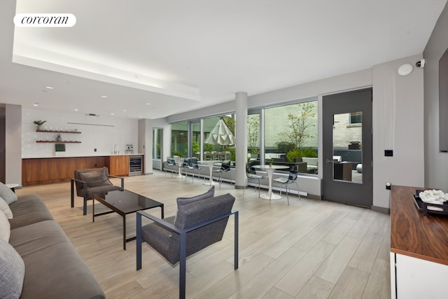 425 W 53rd St Unit 412, New York City, NY 10019 - living room featuring recessed lighting, wine cooler, visible vents, and light wood-style floors