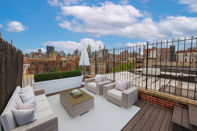 328 W 17th St Unit 5E, New York City, NY 10011 - wooden terrace with an outdoor living space and a view of city