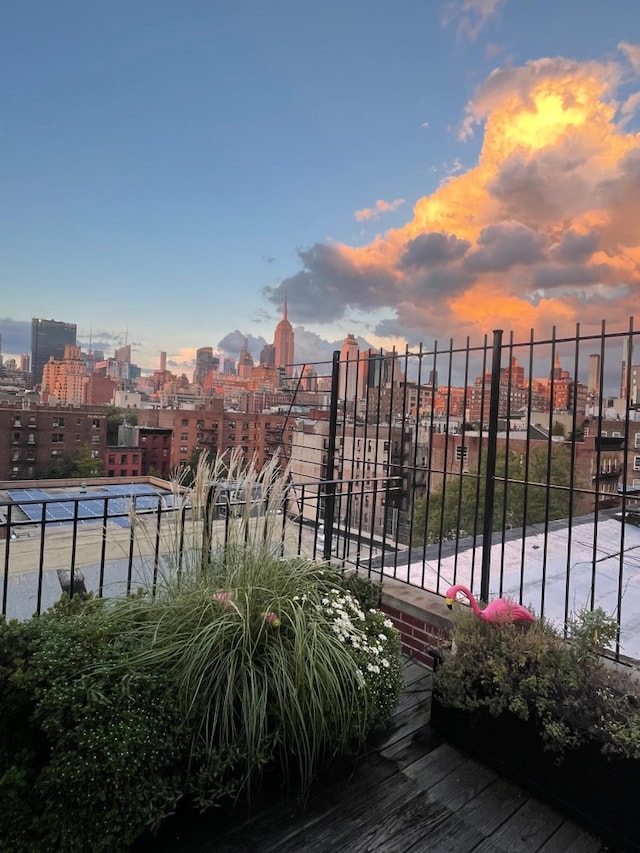 328 W 17th St Unit 5E, New York City, NY 10011 - balcony at dusk with a view of city