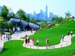 328 W 17th St Unit 5E, New York City, NY 10011 - surrounding community featuring a lawn