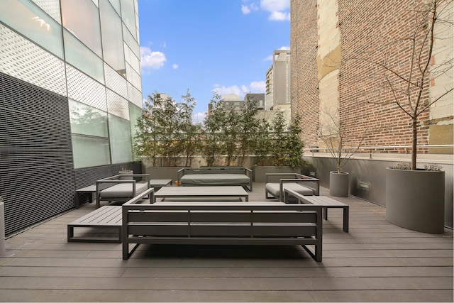 245 10th Ave Unit 3W, New York City, NY 10001 - wooden deck featuring an outdoor hangout area