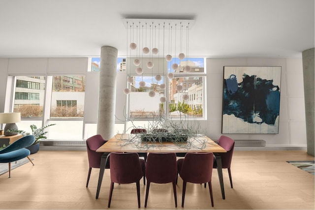 245 10th Ave Unit 3W, New York City, NY 10001 - dining area with wood finished floors