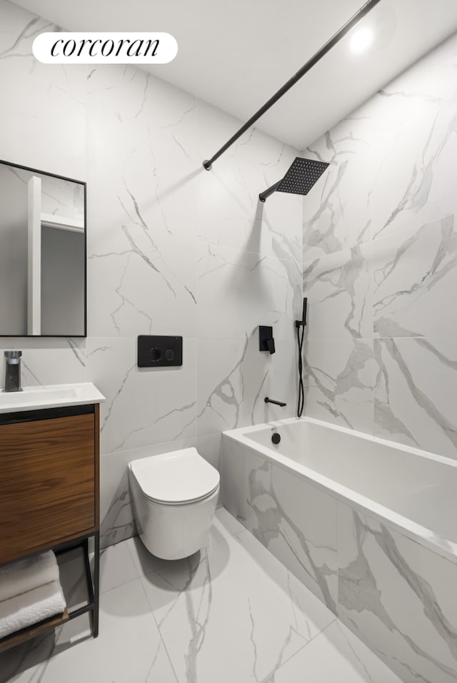 407 Lincoln Rd, New York City, NY 11225 - bathroom featuring vanity, marble finish flooring, a combined bath / shower with marble appearance, toilet, and tile walls