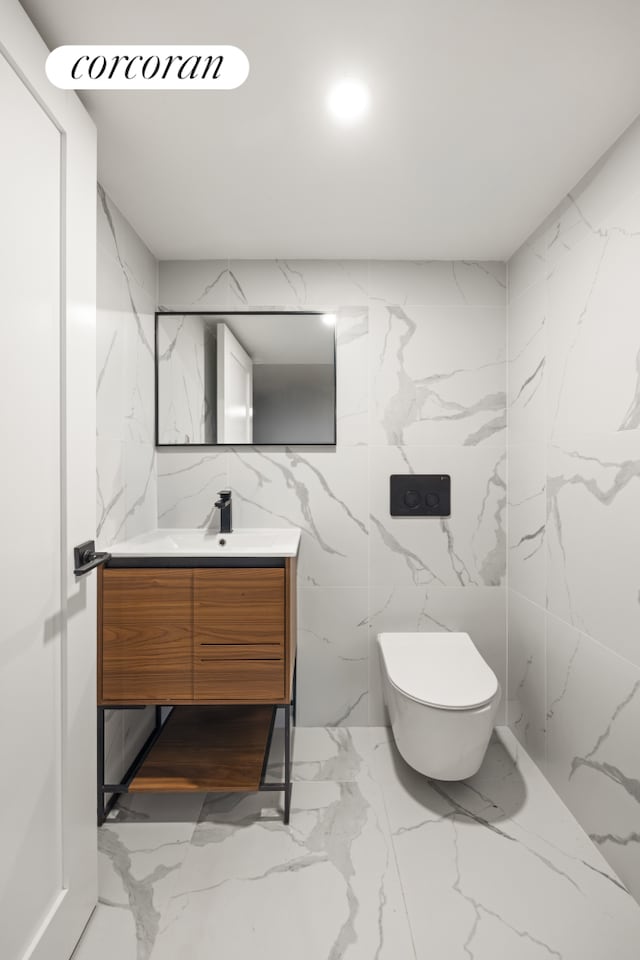 407 Lincoln Rd, New York City, NY 11225 - bathroom with vanity, marble finish floors, and toilet