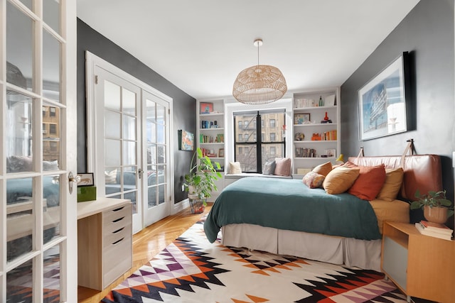 880 W 181st St Unit 2-C, New York City, NY 10033 - bedroom with french doors and access to outside