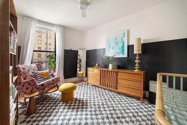 880 W 181st St Unit 2-C, New York City, NY 10033 - sitting room with ceiling fan and carpet