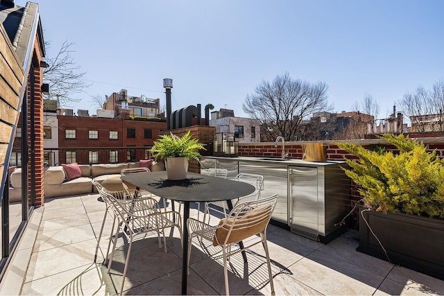 exterior space with a patio area and a sink