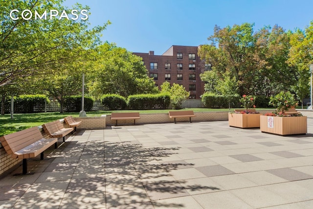 view of property's community featuring a patio