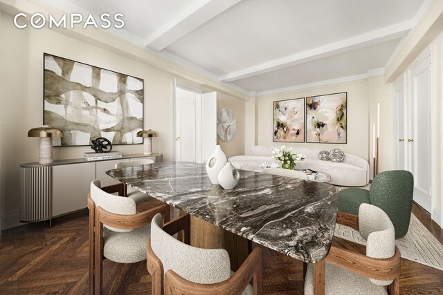 dining room featuring beamed ceiling