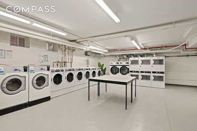 community laundry with washer and clothes dryer