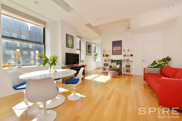 99 John St Unit 2504, New York City, NY 10038 - living area featuring light wood-type flooring