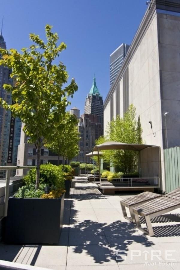 99 John St Unit 2504, New York City, NY 10038 - surrounding community with a city view