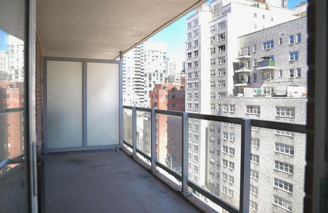 balcony featuring a view of city