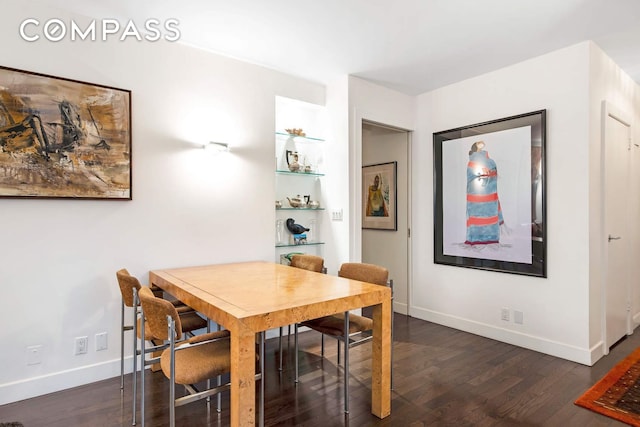 520 E 76th St Phc, Phc, New York City, NY 10021 - dining room featuring dark wood finished floors