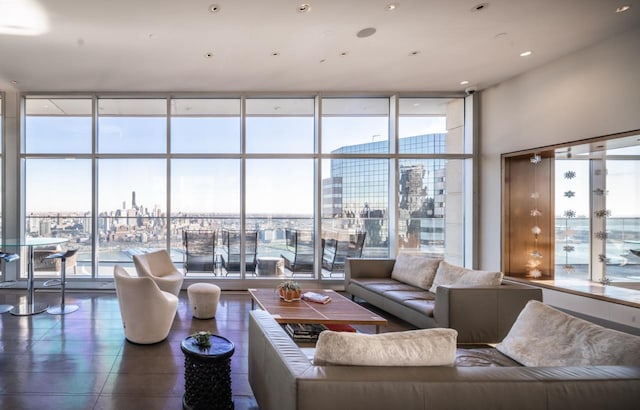 building lobby with floor to ceiling windows and a city view