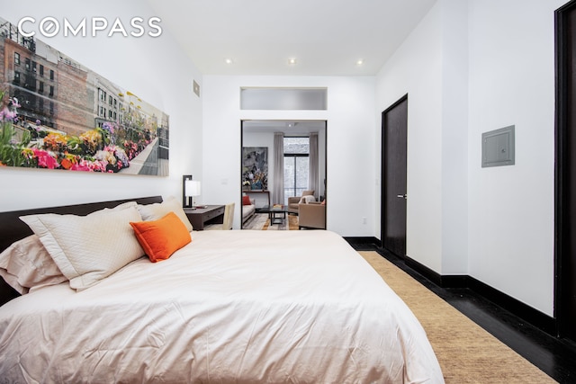 254 Park Ave S Unit 7P, New York City, NY 10010 - bedroom featuring recessed lighting, baseboards, and wood finished floors