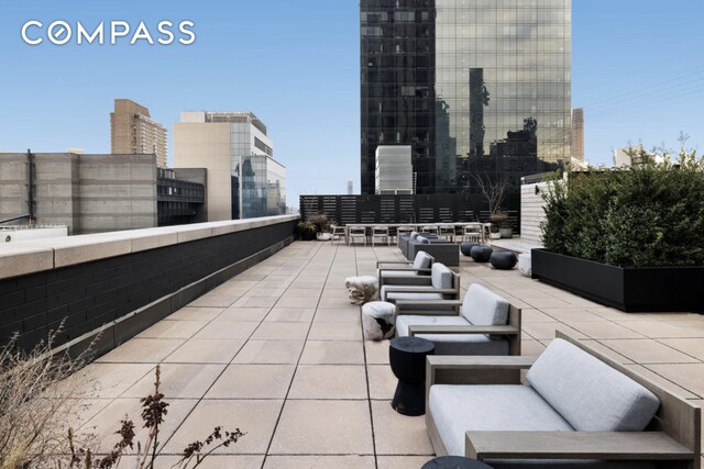 401 E 60th St Unit 35B, New York City, NY 10022 - view of patio / terrace with a city view