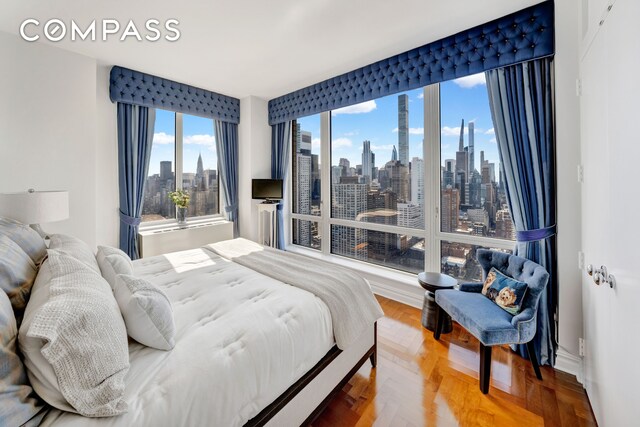 401 E 60th St Unit 35B, New York City, NY 10022 - bedroom with baseboards