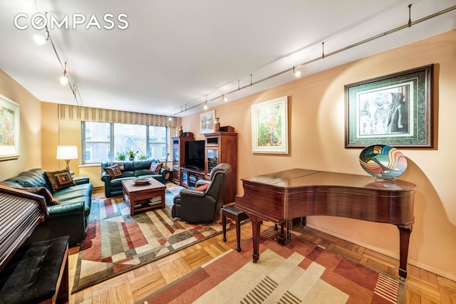 80 E End Ave Unit 3Hj, New York City, NY 10028 - living area with rail lighting and baseboards