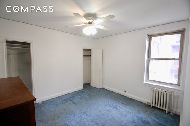 43-10 48th Ave Unit 2P, New York City, NY 11377 - unfurnished bedroom with radiator, carpet floors, baseboards, and a ceiling fan