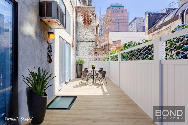 40 W 15th St Unit 1C, New York City, NY 10011 - wooden deck featuring outdoor dining area
