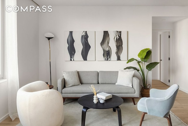 66 Clinton St Unit 5B, New York City, NY 10002 - living room with wood finished floors and baseboards