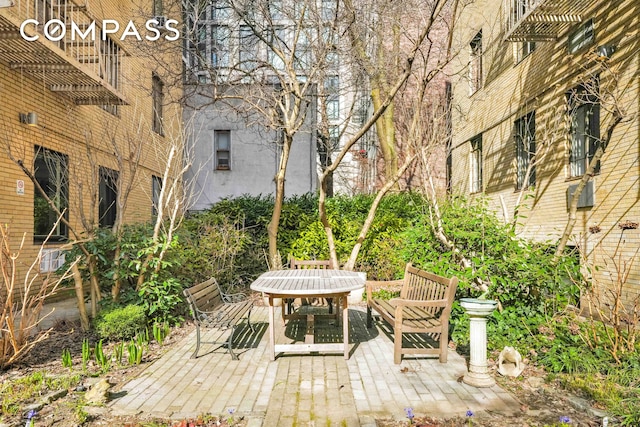 deck featuring outdoor dining space and a patio area