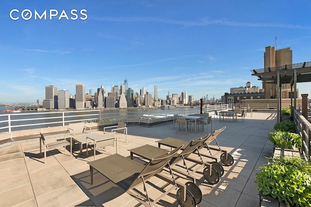 view of patio / terrace featuring a city view