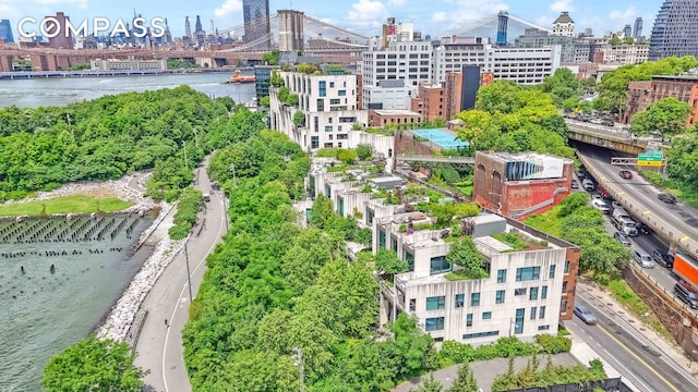 aerial view with a view of city and a water view