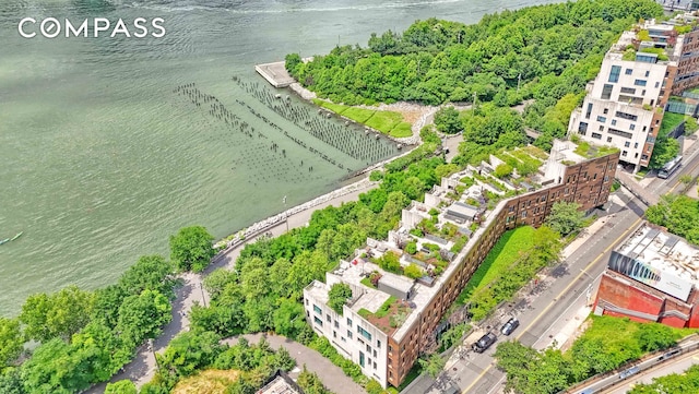 drone / aerial view featuring a water view