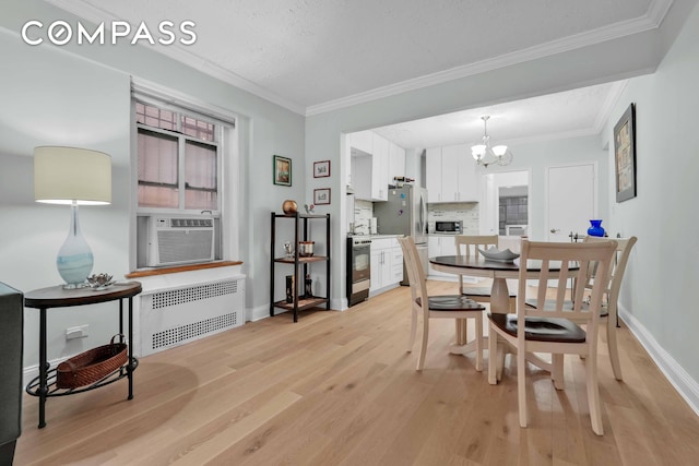 dining room featuring cooling unit, a chandelier, radiator, light wood-type flooring, and ornamental molding
