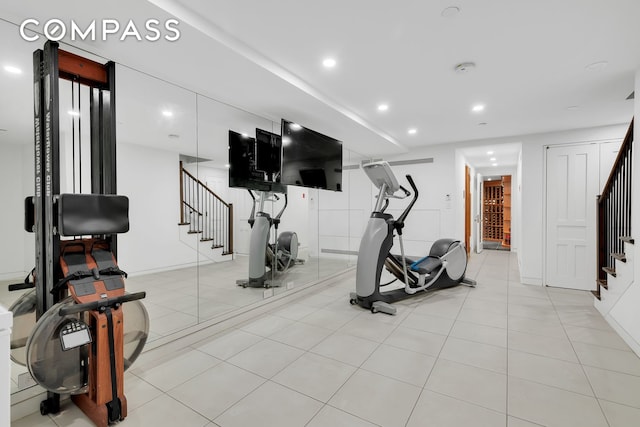 exercise room with recessed lighting