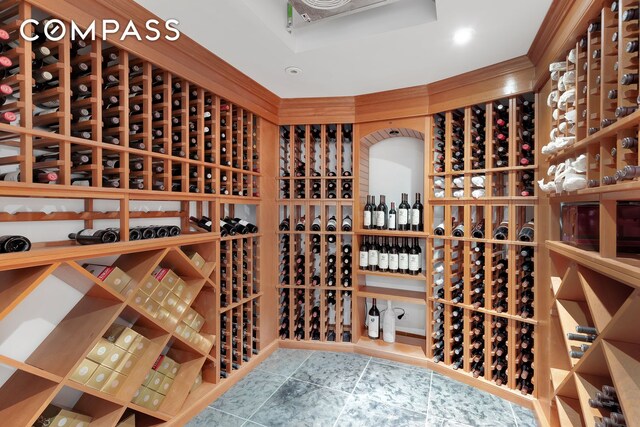wine area featuring tile patterned flooring
