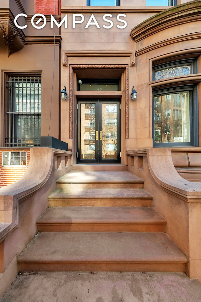 view of exterior entry with french doors