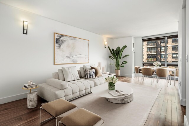 300 E 79th St Unit 5C, New York City, NY 10075 - living area with baseboards and wood finished floors