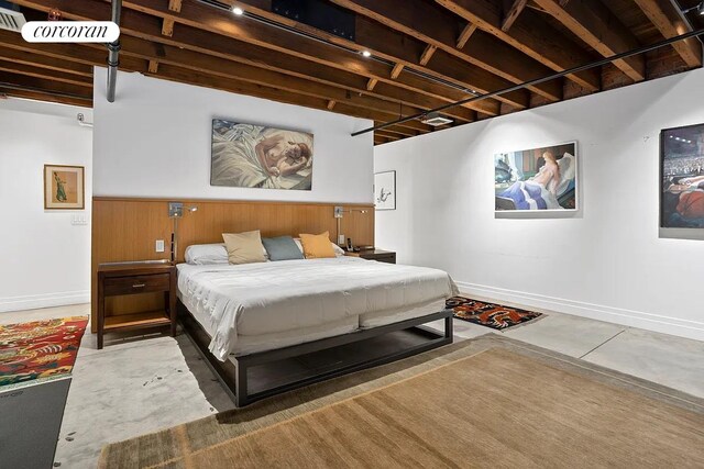 53 Crosby St Unit 1, New York City, NY 10012 - bedroom featuring concrete flooring and baseboards