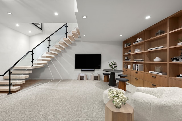 living area featuring recessed lighting, stairway, light carpet, and baseboards
