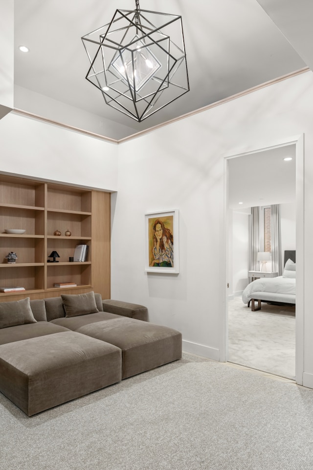 carpeted living room with recessed lighting and baseboards