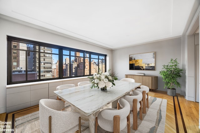 dining room featuring a view of city