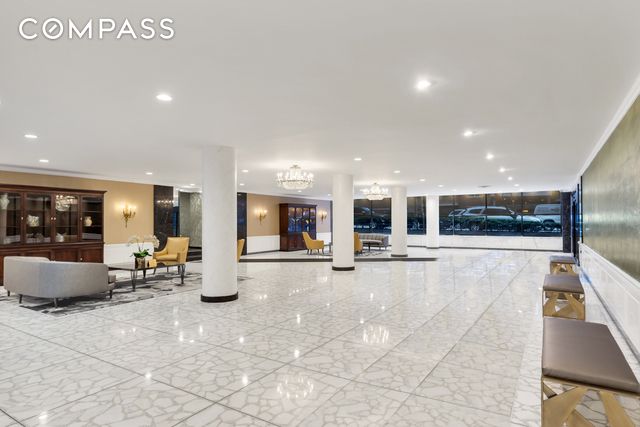 370 E 76th St Unit C1208, New York City, NY 10021 - building lobby featuring recessed lighting