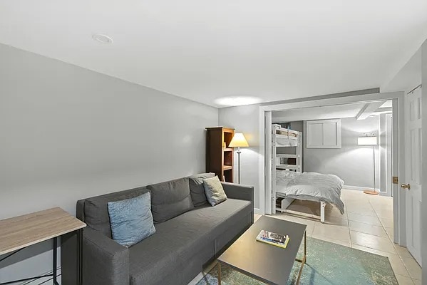 living room featuring light tile patterned floors