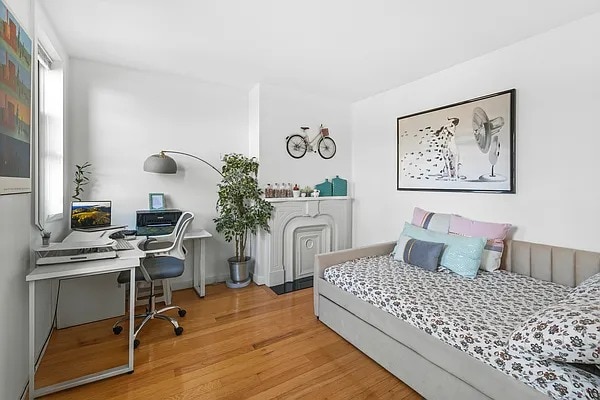 bedroom featuring wood finished floors