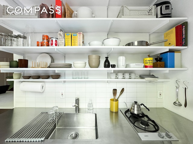 pantry featuring a sink