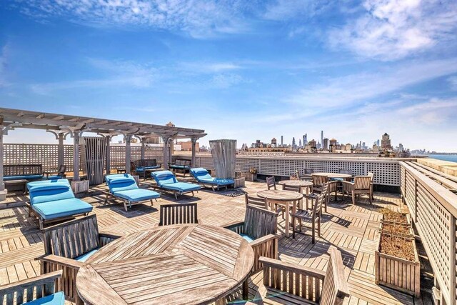 390 Riverside Dr Unit 6D, New York City, NY 10025 - view of patio with a pergola and a skyline view