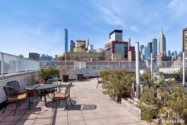 view of patio featuring a skyline view