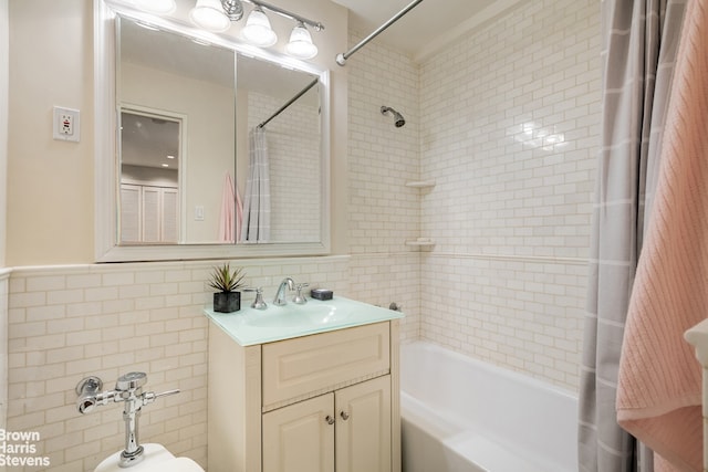 30 E 37th St Unit 4Hj, New York City, NY 10016 - full bath with tile walls, shower / bath combination with curtain, and vanity