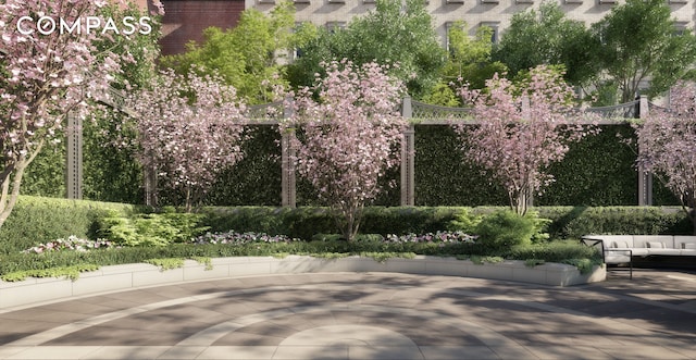 view of property's community featuring an outdoor living space