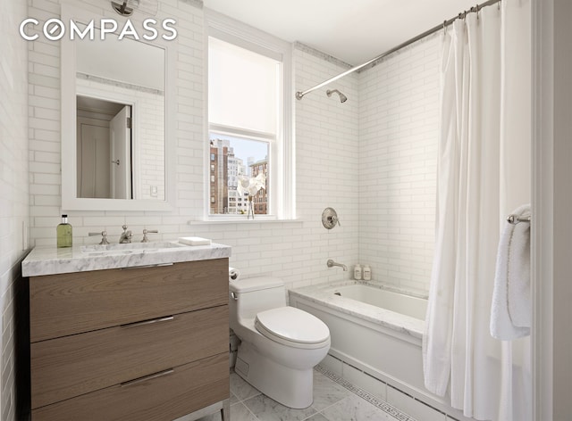40 E 66th St Unit 9A, New York City, NY 10065 - full bath featuring toilet, shower / bathtub combination with curtain, tile walls, vanity, and marble look tiles