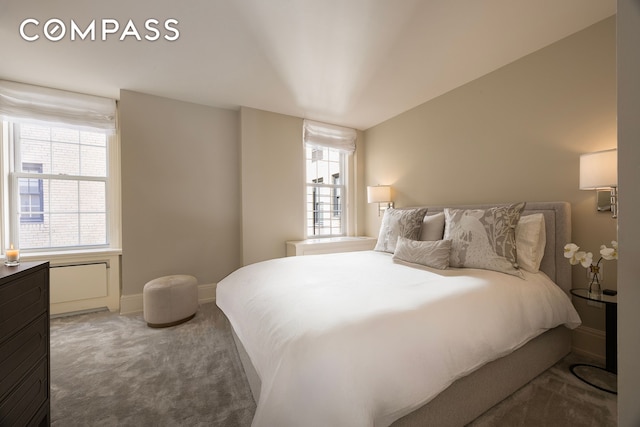 40 E 66th St Unit 9A, New York City, NY 10065 - bedroom with carpet floors, multiple windows, and baseboards