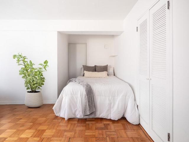 bedroom featuring baseboards